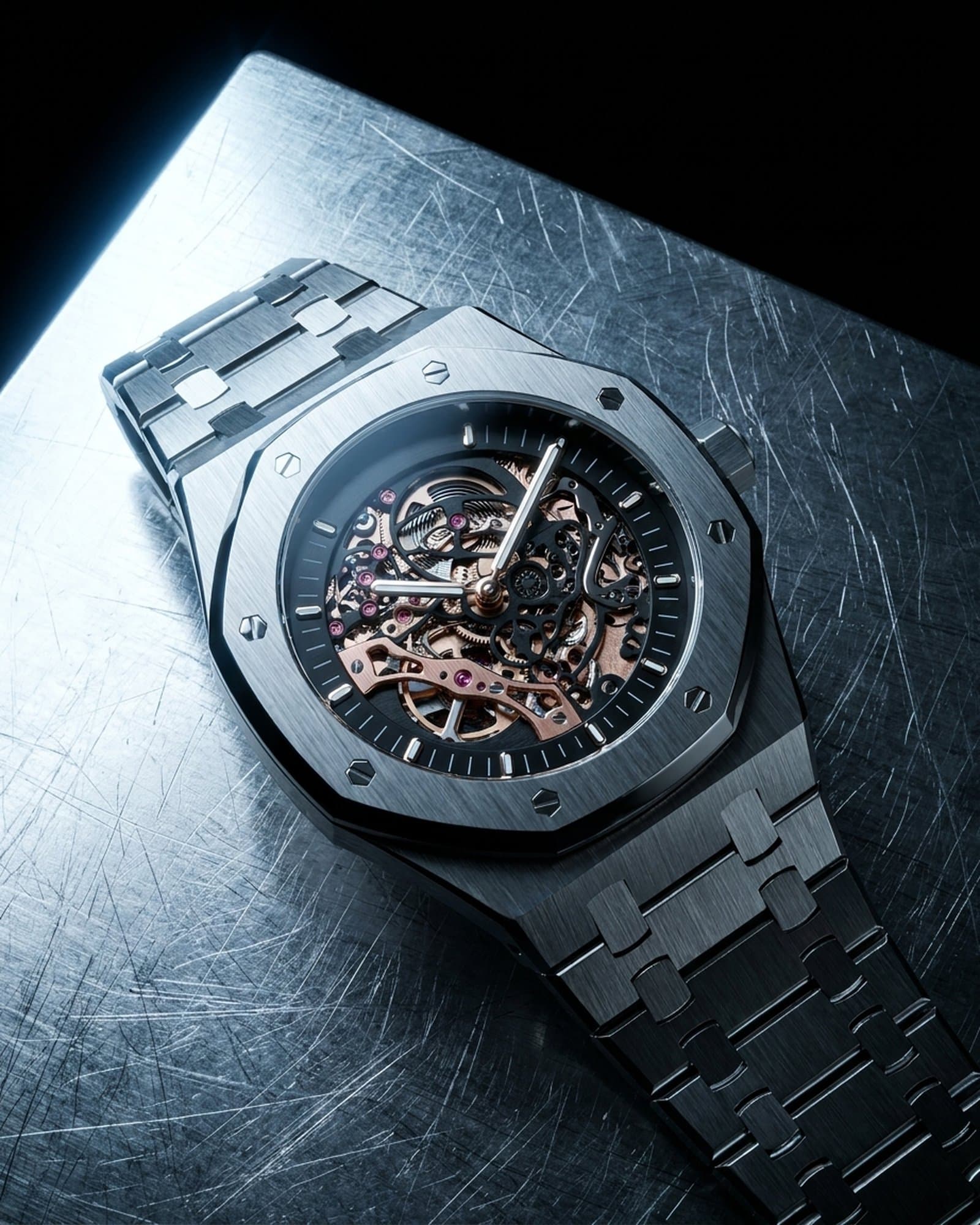 Octagon skeleton watch lying on scratched steel under a cold light